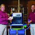 Christy King, Clarke County Extension agent, and Roberto Gallardo, an associate Extension professor in the Center for Technology Outreach, display items made with a new 3-D printer at the Quitman Public Library. (Photo by MSU Extension Service/Kevin Hudson)