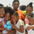 Campers (front row, from left) Jendiya Harkins, Jayda Robson, Ankeria Harkins and Morgan Peterson; and Travis Jones and Ceniyah Jamison learn robotics at a community summer camp on July 11, 2016 in Artesia, Miss. The Mississippi State University Extension Service and 4-H uses robotics to introduce children to science, technology, engineering and mathematics programs at an early age. (Photo by MSU Extension Service/Michaela Parker)