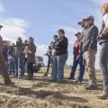 Rachel Stout Evans, a soil scientist with the Natural Resources Conservation Service, speaks to Mississippi State University Extension agents at a row crop farm in Shaw, Mississippi.