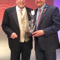 Mississippi State University Extension Service floral design specialist Jim DelPrince, right, accepted the American Institute of Floral Designers Award of Distinguished Service to the Floral Industry from Awards Committee Chairman Rich Salvaggio during the organization’s annual National Symposium in July. (Photo courtesy of American Institute of Floral Designers)