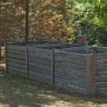 An Ocean Springs Master Gardener developed these three compost bins, which are more elaborate than most home gardeners create. Each bin holds compost at a different stage of decomposition. (Photos by Norman Winter)