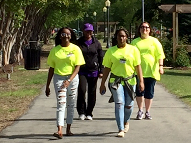 Students walk with the Director of the CCDTC and Allied Health teacher